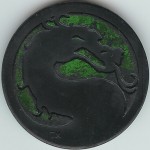 Mortal Kombat Logo
Foreground: Black<br />Background: Green

(Front Image)