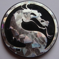Mortal Kombat Logo
Foreground: Silver<br />Background: Black

(Front Image)